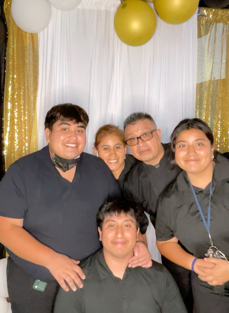 Chef Jorge with his family crew at an event